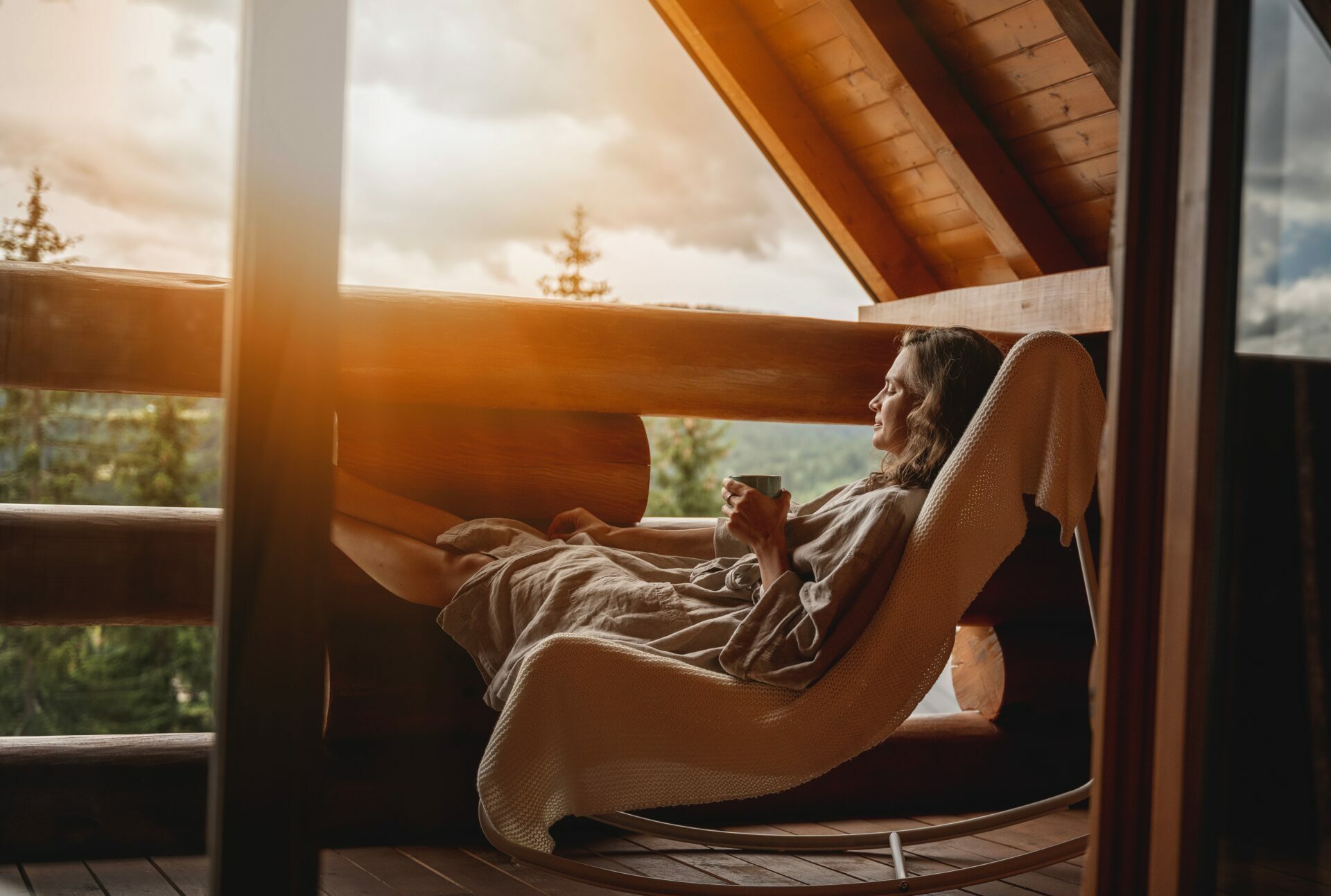 Young,Relaxed,Cheerful,Woman,Enjoying,Nature,On,The,Balcony,Of